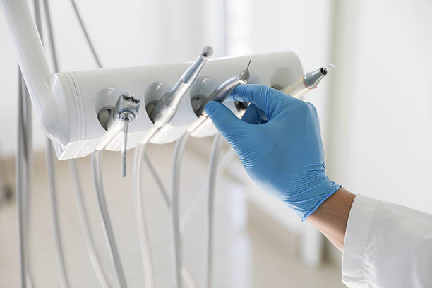 Professional Tooth Extraction technician working in Byrnes Mill, MO
